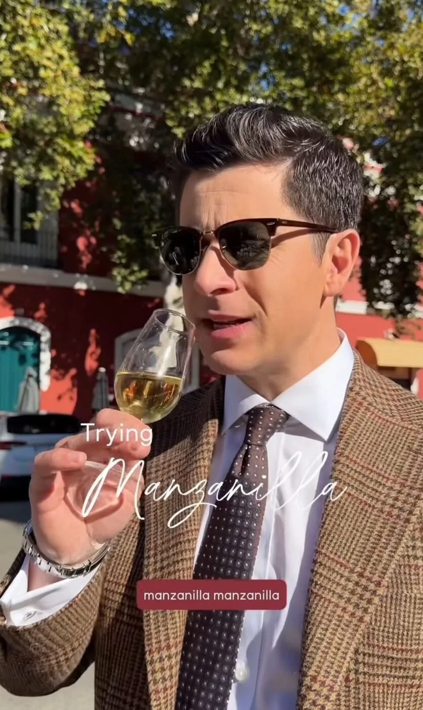 David Henrie sips manzanilla sherry in a still from the Seeking Beauty series filmed in Spain