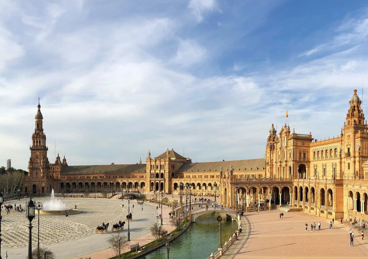 Plaza de España's towers, canal, and fountain in Seville, voted among the most beautiful cities in Europe