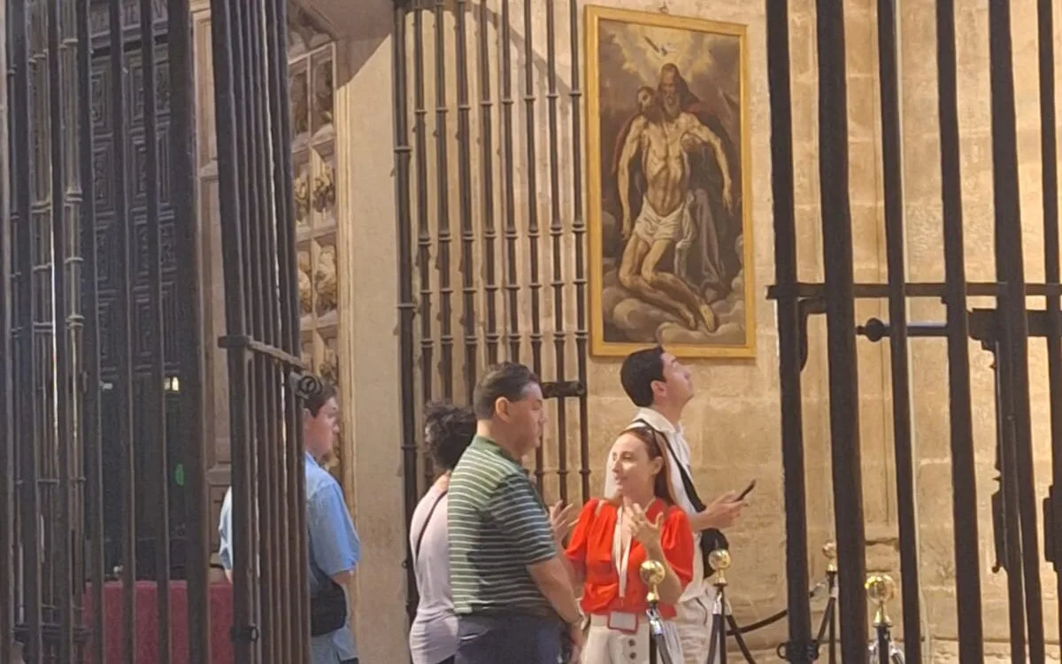 Travellers exploring Seville Cathedral at their own pace on a self-guided audio tour